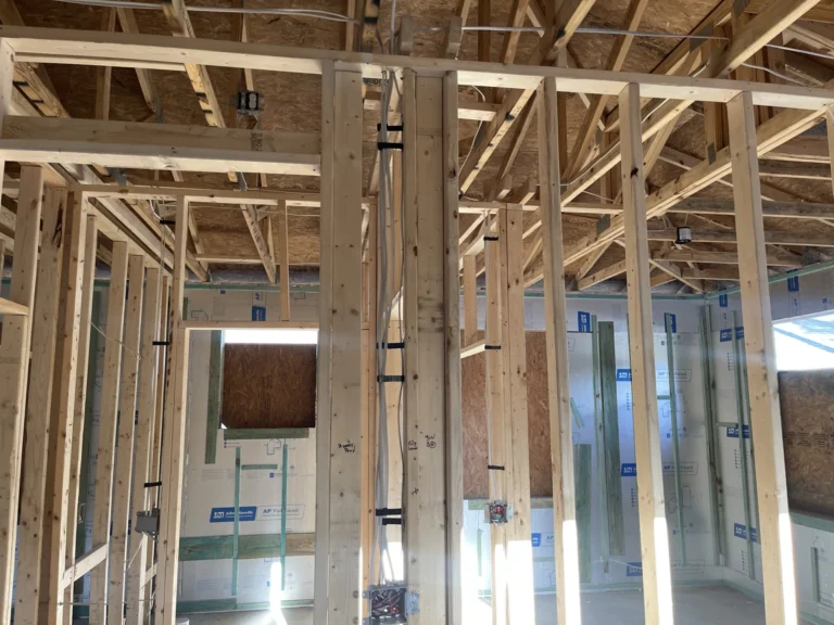 Wood stud framing and rigid insulation board on interior walls of new residential construction, Tampa Bay FL — Power Contractor Group, CGC1539545